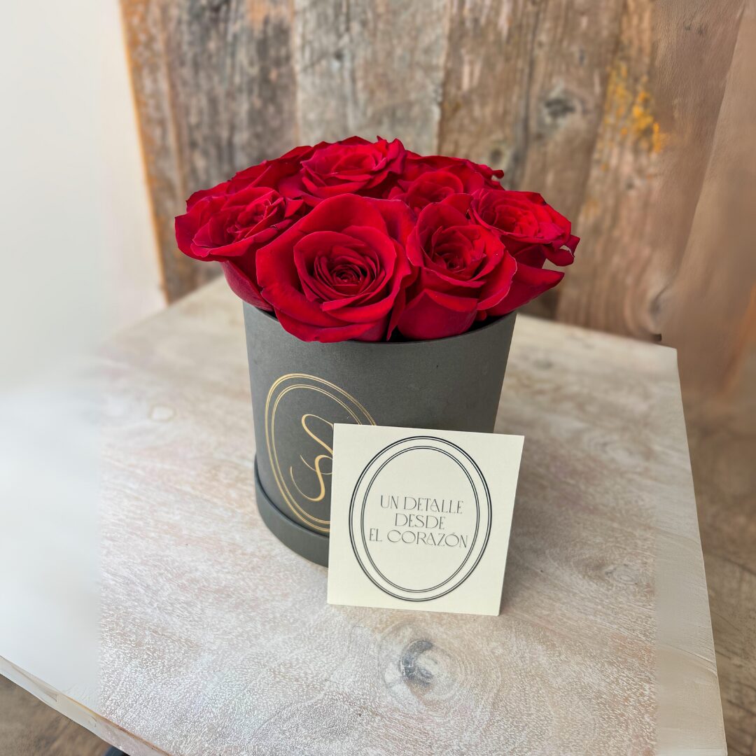 GRAY CYLINDER WITH 12 RED ROSES