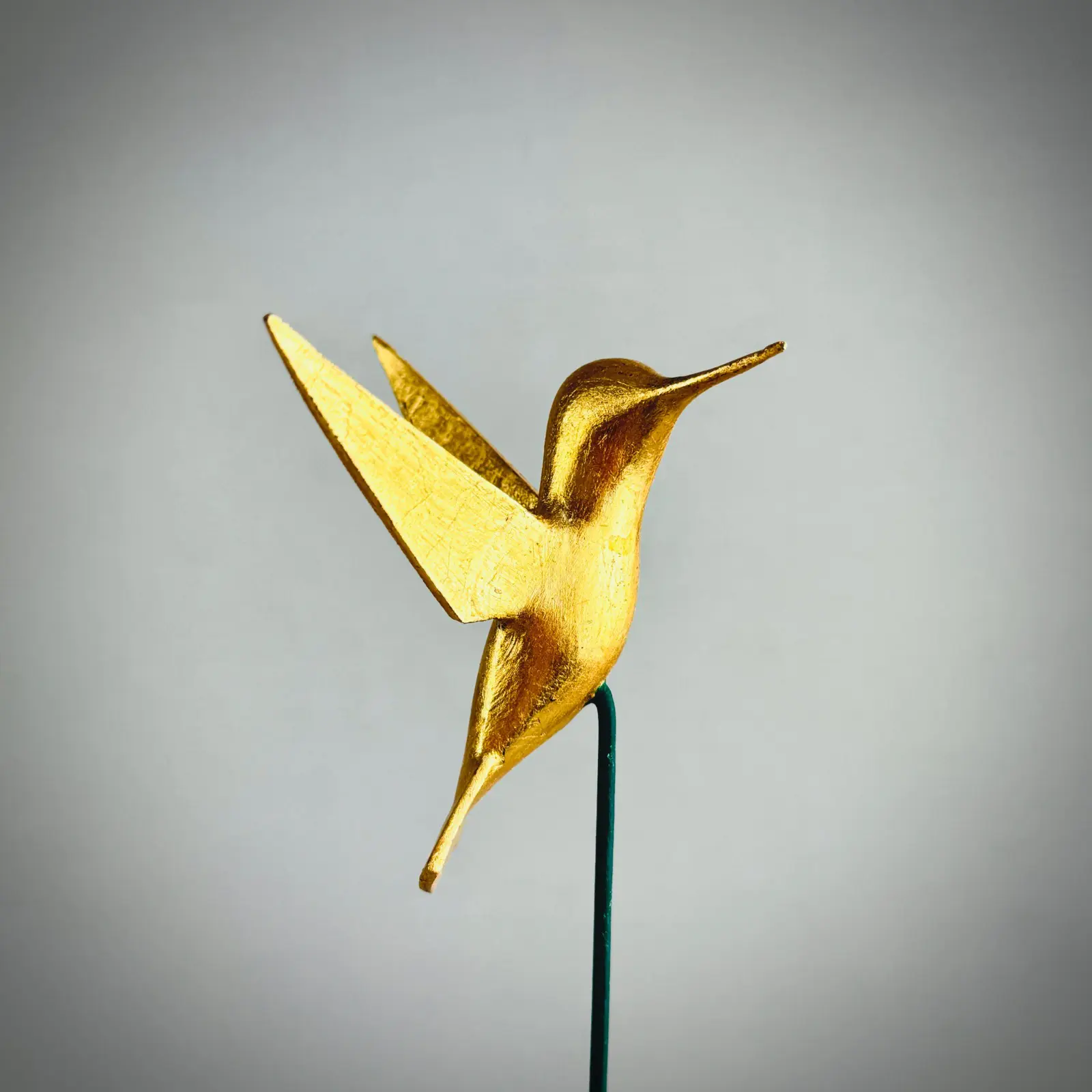 HUMMINGBIRD WITH STICK BY DAVID NAVA